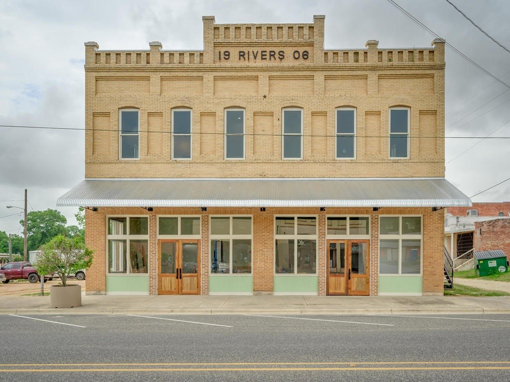 110 South Main Street, Unit 104 Elgin, TX 78621 - Photo 2 of 20 a front view of a building