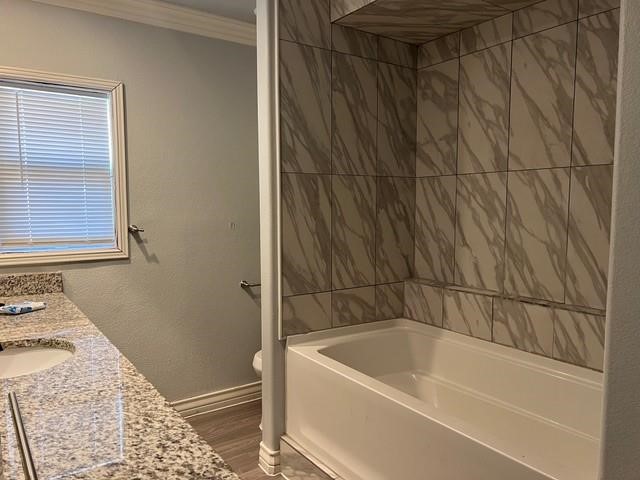 5375 County Road 73A, Unit 2 Robstown, TX 78380 - Photo 12 of 14 a bathroom with a bathtub