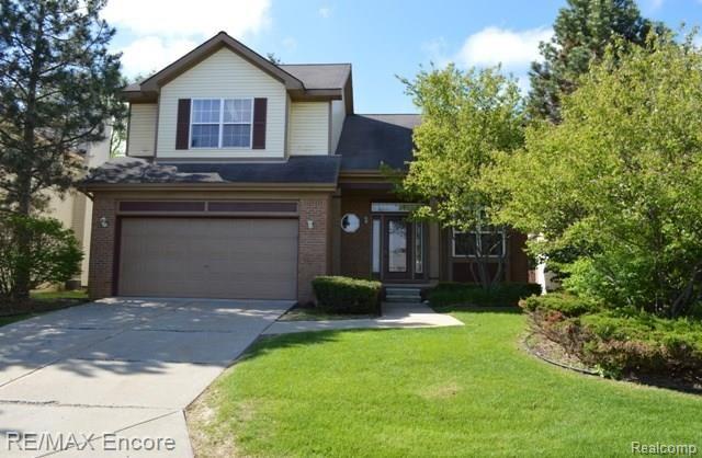 14 Eagle Ridge Road Lake Orion, MI 48360 - Photo 21 of 21 Summer photo of 14 Eagle Ridge Road. Welcome home!