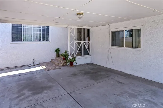 a view of livingroom with hardwood floor and windows