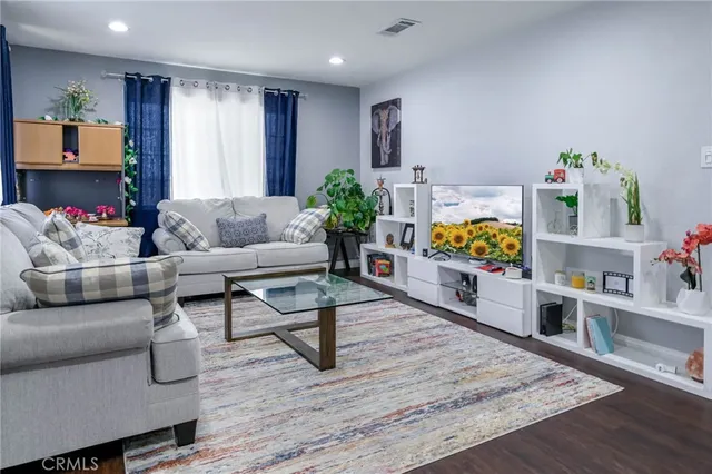 a living room with furniture and a couch