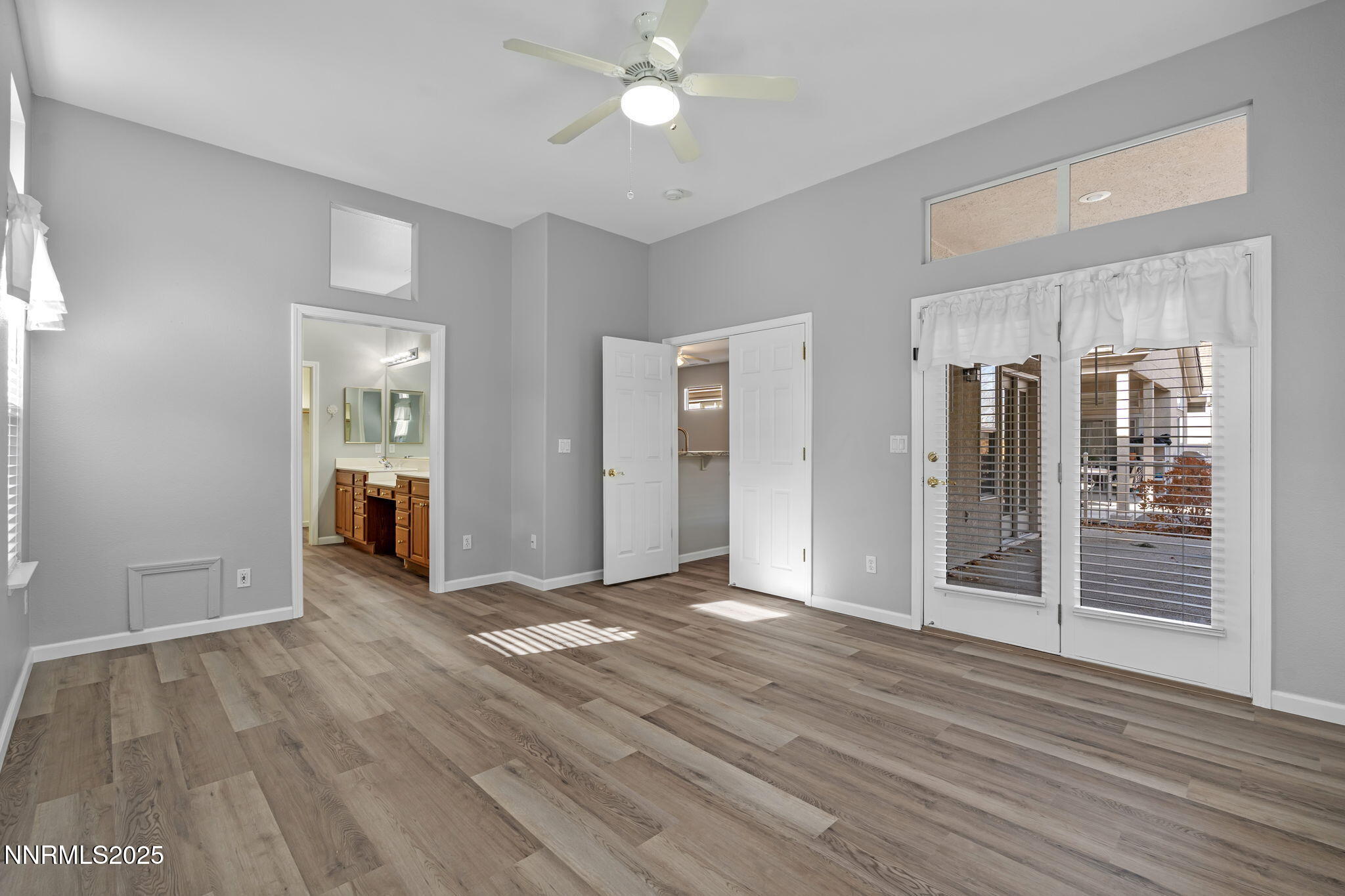 412 Sierra Leaf Circle Reno, NV 89511 - Photo 23 of 36 wooden floor in an empty room with a window