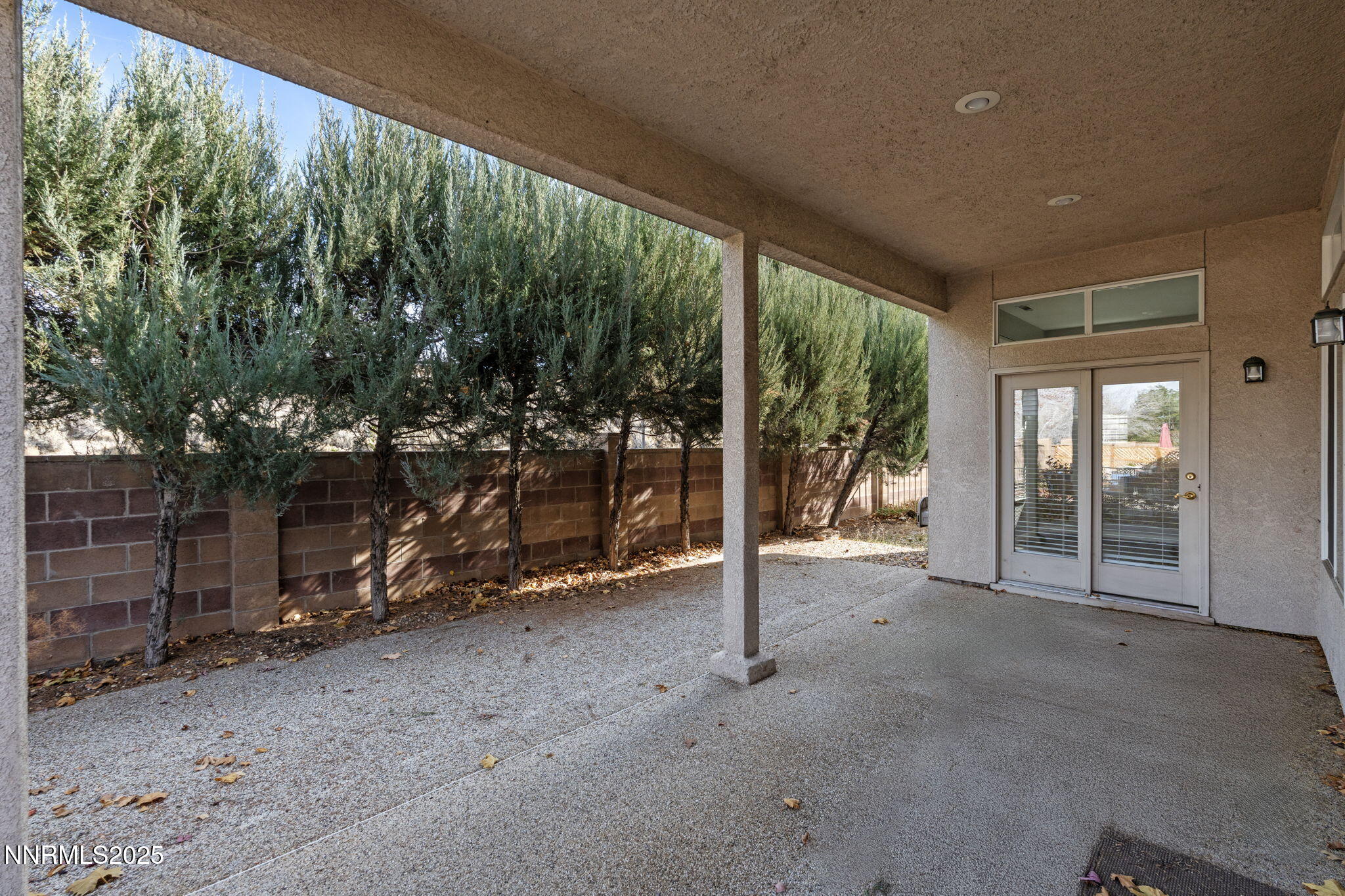 412 Sierra Leaf Circle Reno, NV 89511 - Photo 33 of 36 a view of an empty room with wooden floor and balcony