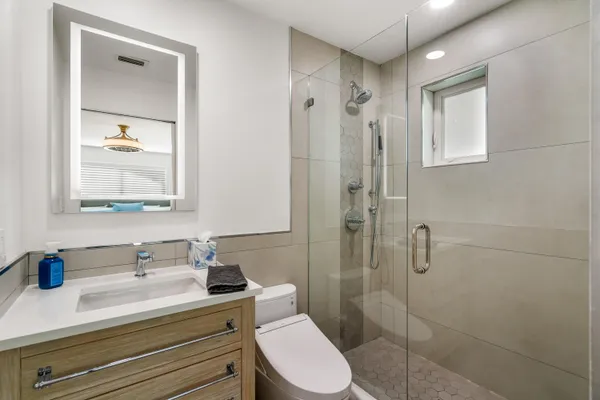 a bathroom with a sink and a toilet