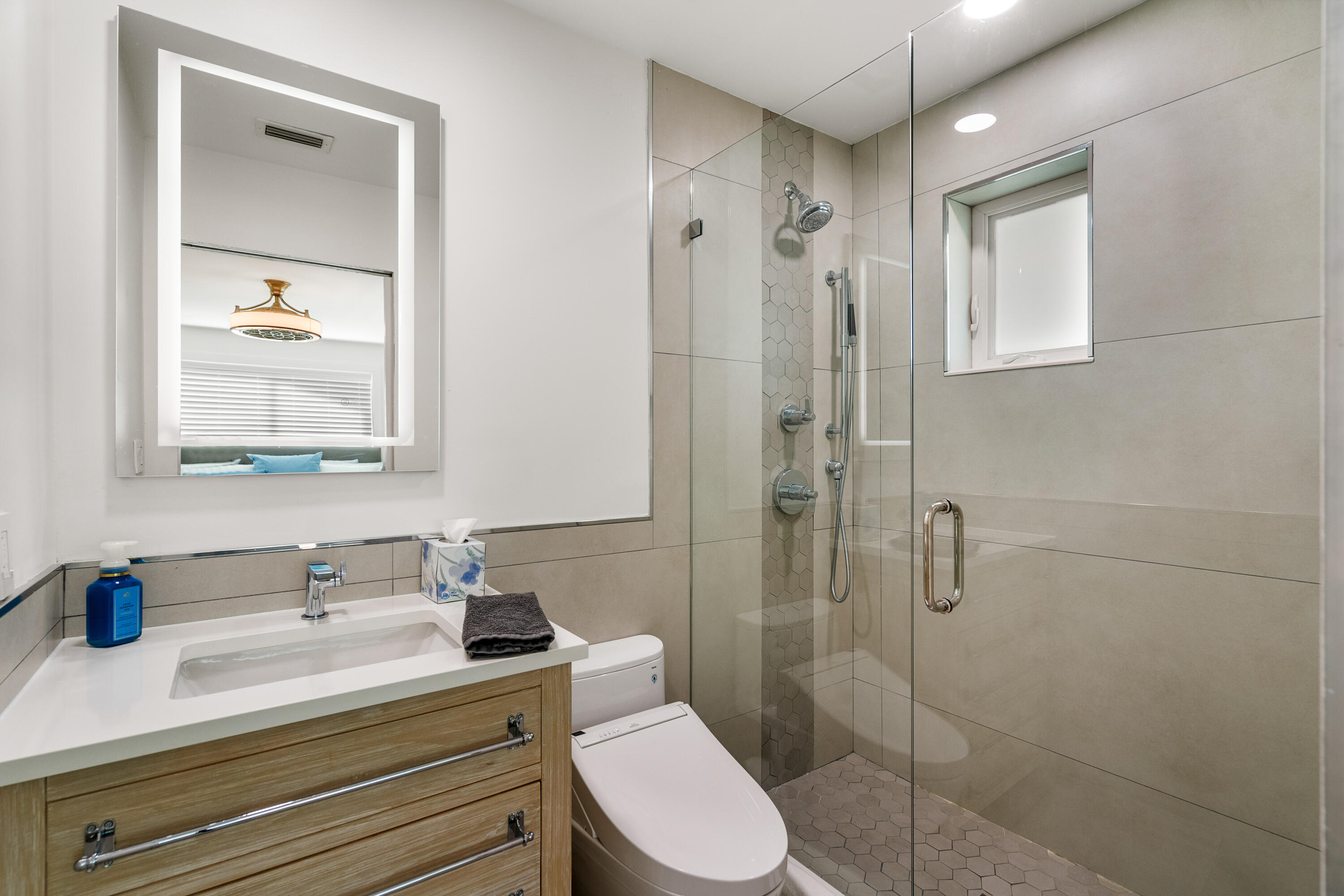 114 Spoonbill Road Tavernier, FL 33070 - Photo 15 of 43 a bathroom with a sink a toilet and shower