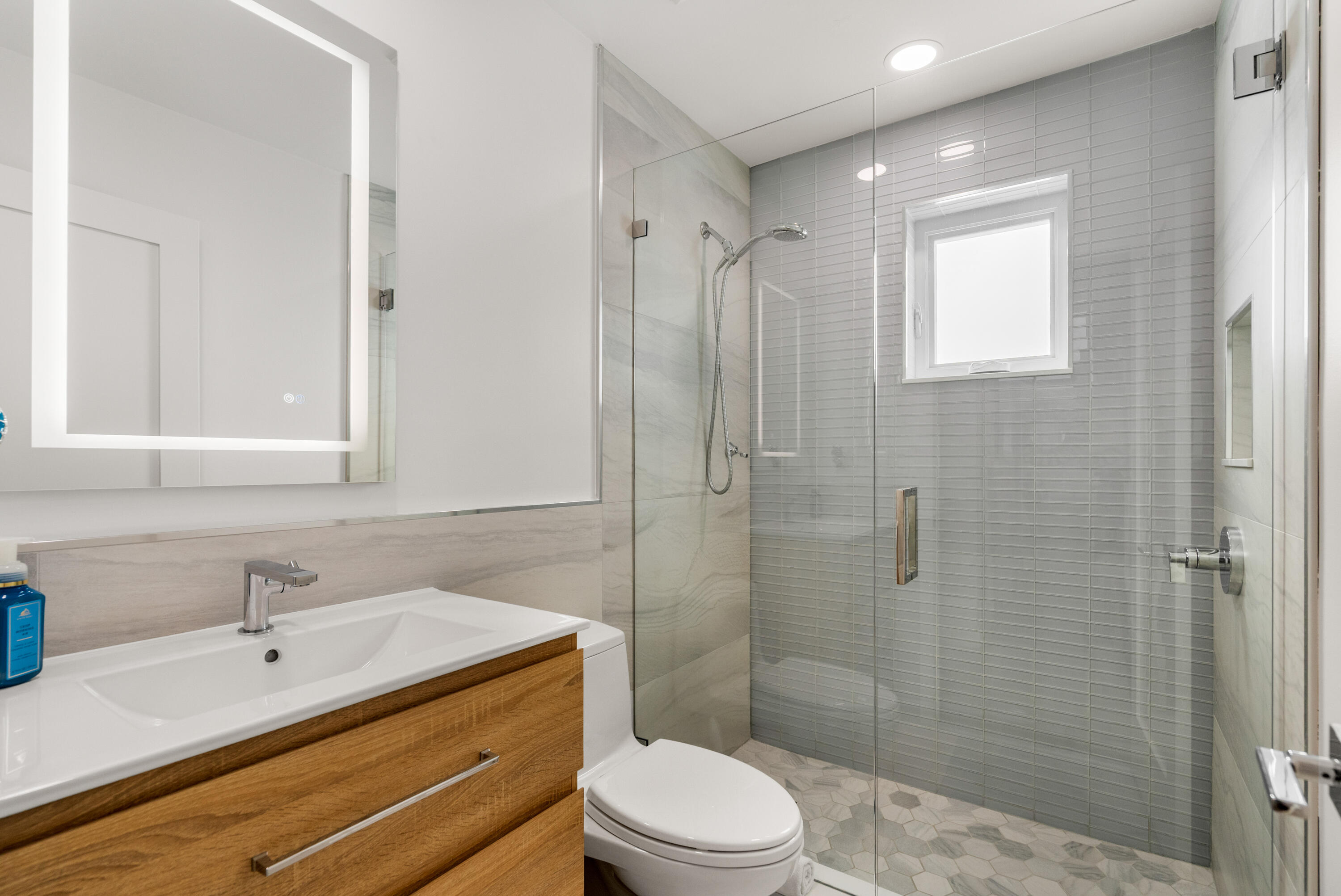 114 Spoonbill Road Tavernier, FL 33070 - Photo 22 of 43 a bathroom with a sink a toilet and shower