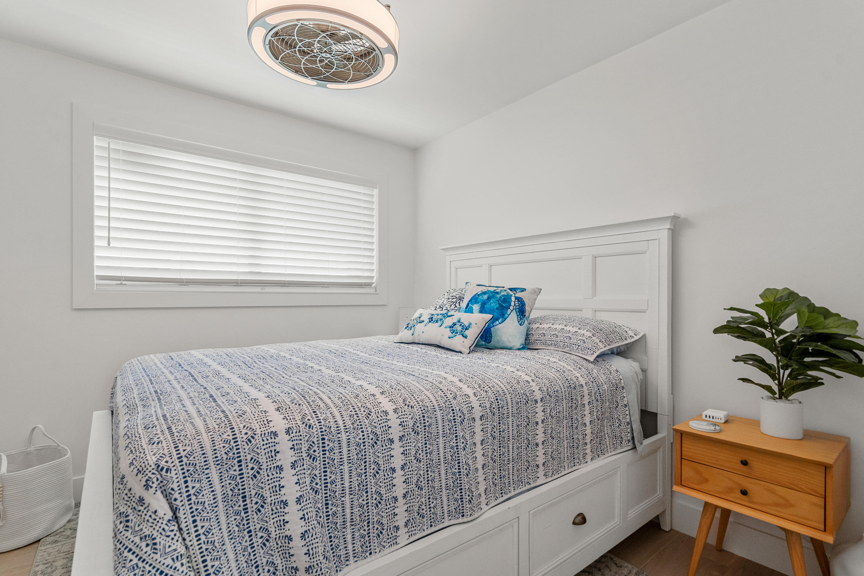 114 Spoonbill Road Tavernier, FL 33070 - Photo 23 of 43 a bedroom with a bed and window