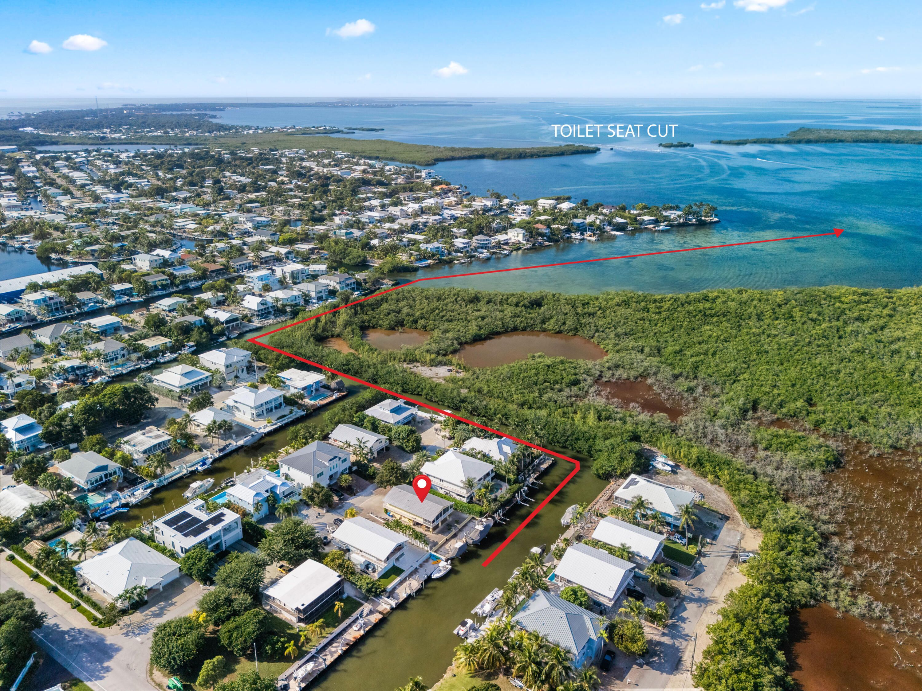 114 Spoonbill Road Tavernier, FL 33070 - Photo 3 of 43 an aerial view of a city