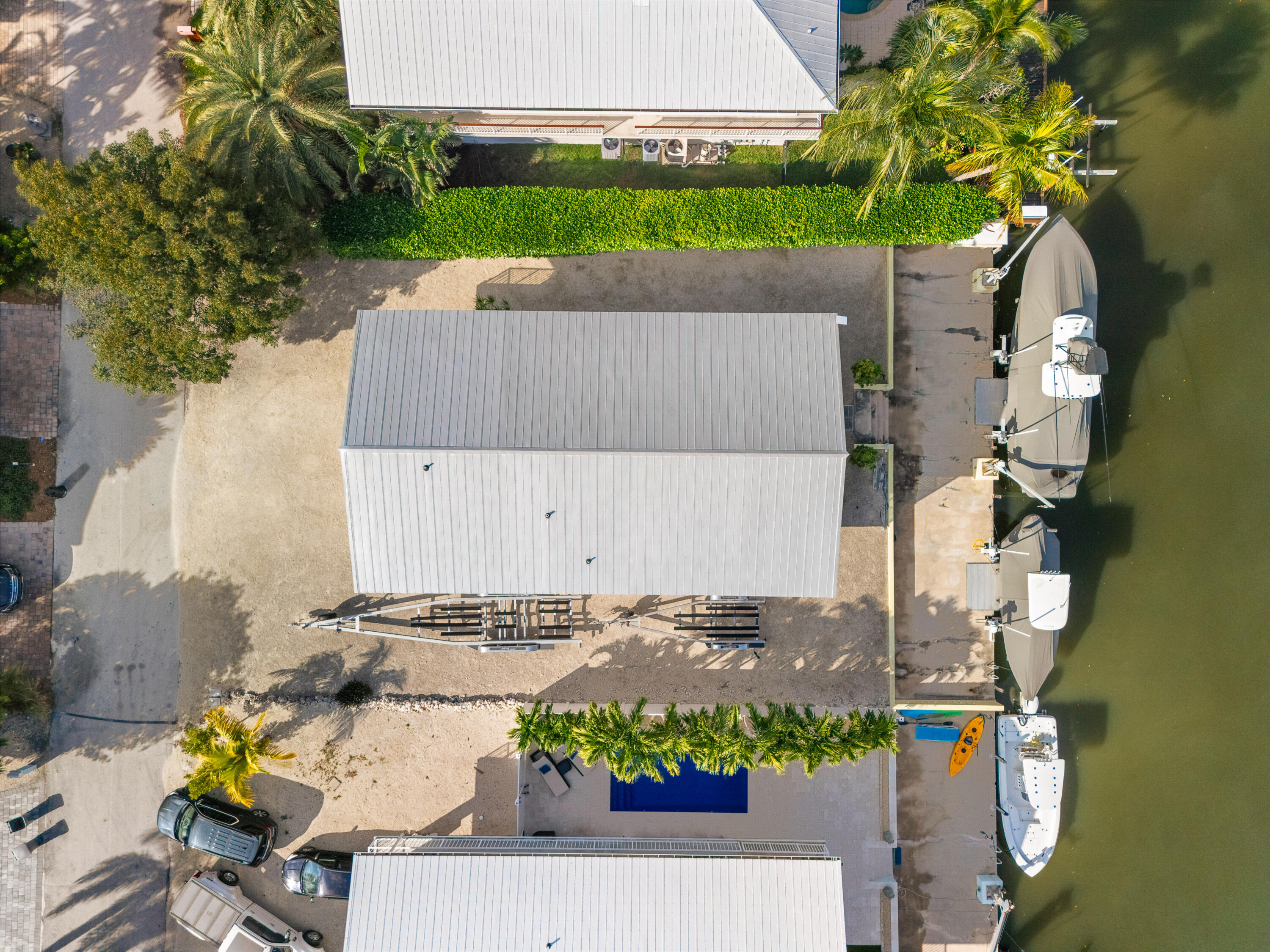 114 Spoonbill Road Tavernier, FL 33070 - Photo 39 of 43 an aerial view of a house with a garden and mountain view
