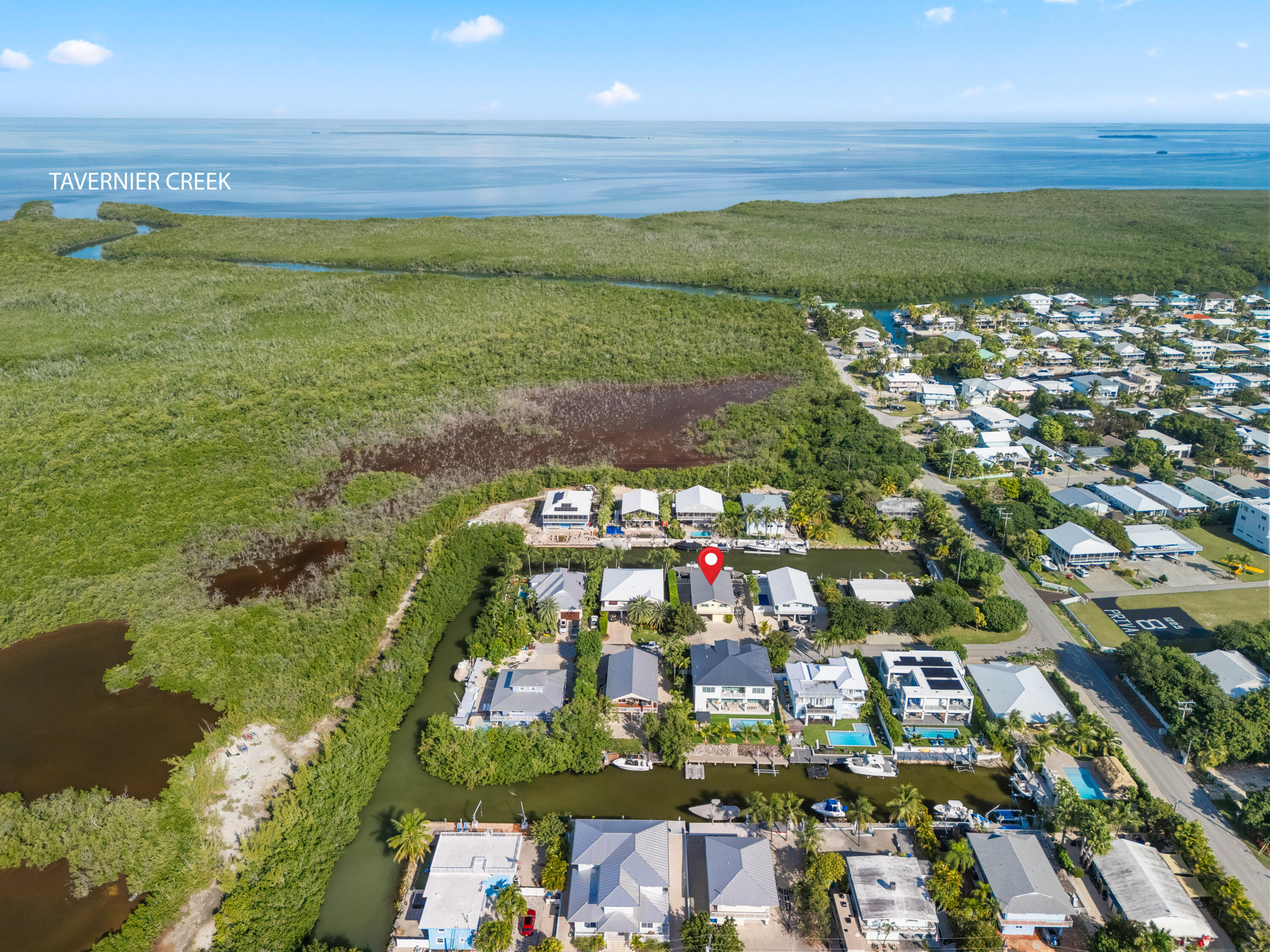 114 Spoonbill Road Tavernier, FL 33070 - Photo 41 of 43 a view of a city with an ocean