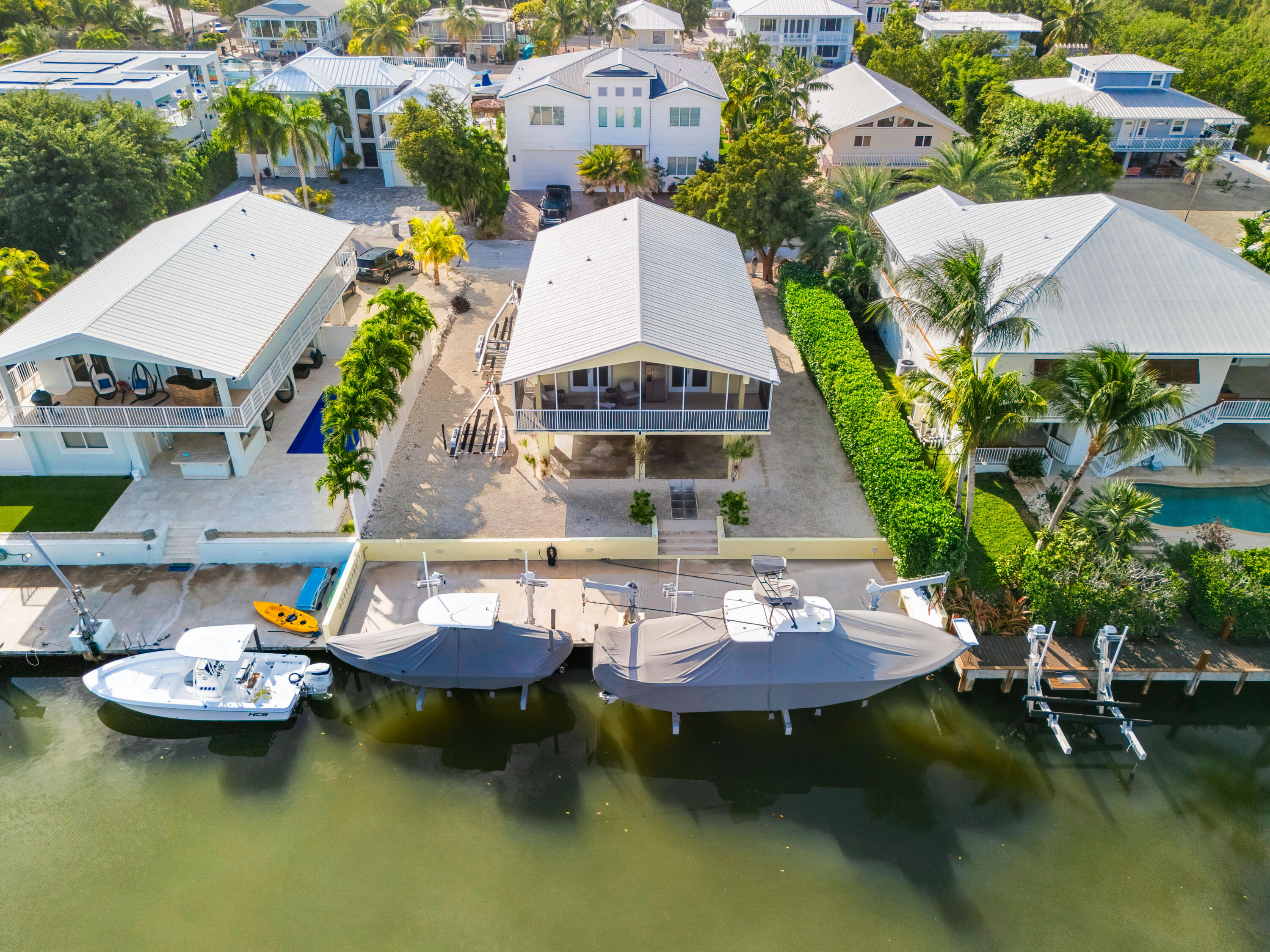 114 Spoonbill Road Tavernier, FL 33070 - Photo 43 of 43 an aerial view of a house with swimming pool patio and outdoor seating