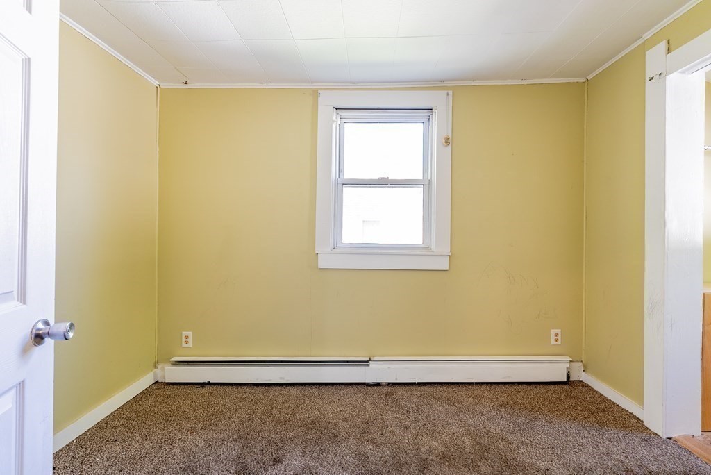 272 Denver Street Springfield, MA 01109 - Photo 25 of 32 an empty room with windows