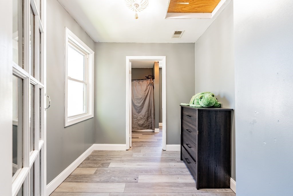 272 Denver Street Springfield, MA 01109 - Photo 8 of 32 a view of an entryway with wooden floor