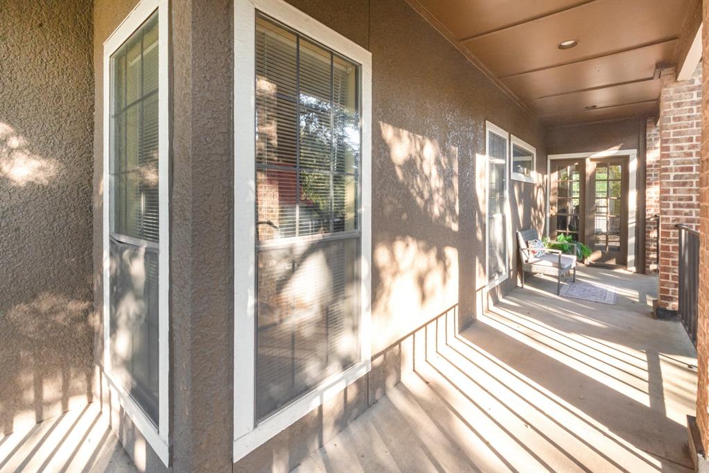 5859 Frankford Road, Unit 802 Dallas, TX 75252 - Photo 32 of 33 a view of a city from a glass door