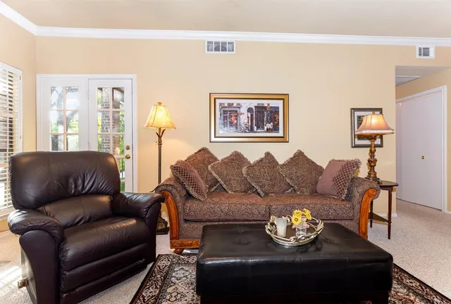 a living room with furniture and a couch