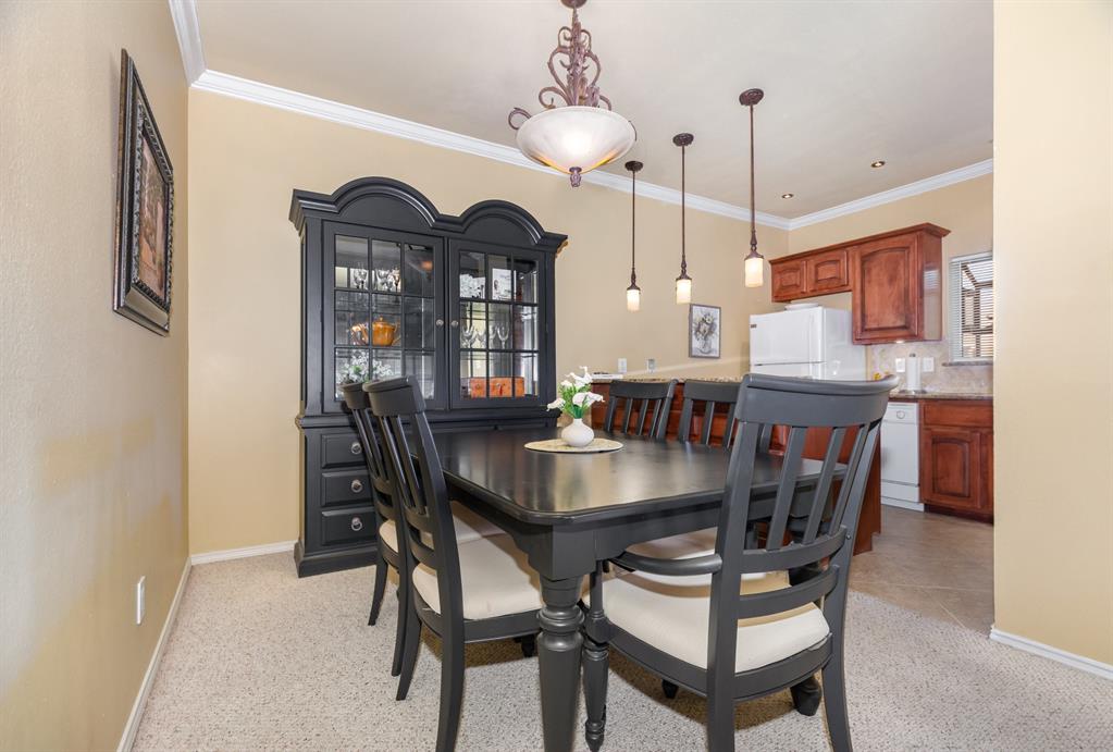 5859 Frankford Road, Unit 802 Dallas, TX 75252 - Photo 9 of 33 a dining room with furniture and window