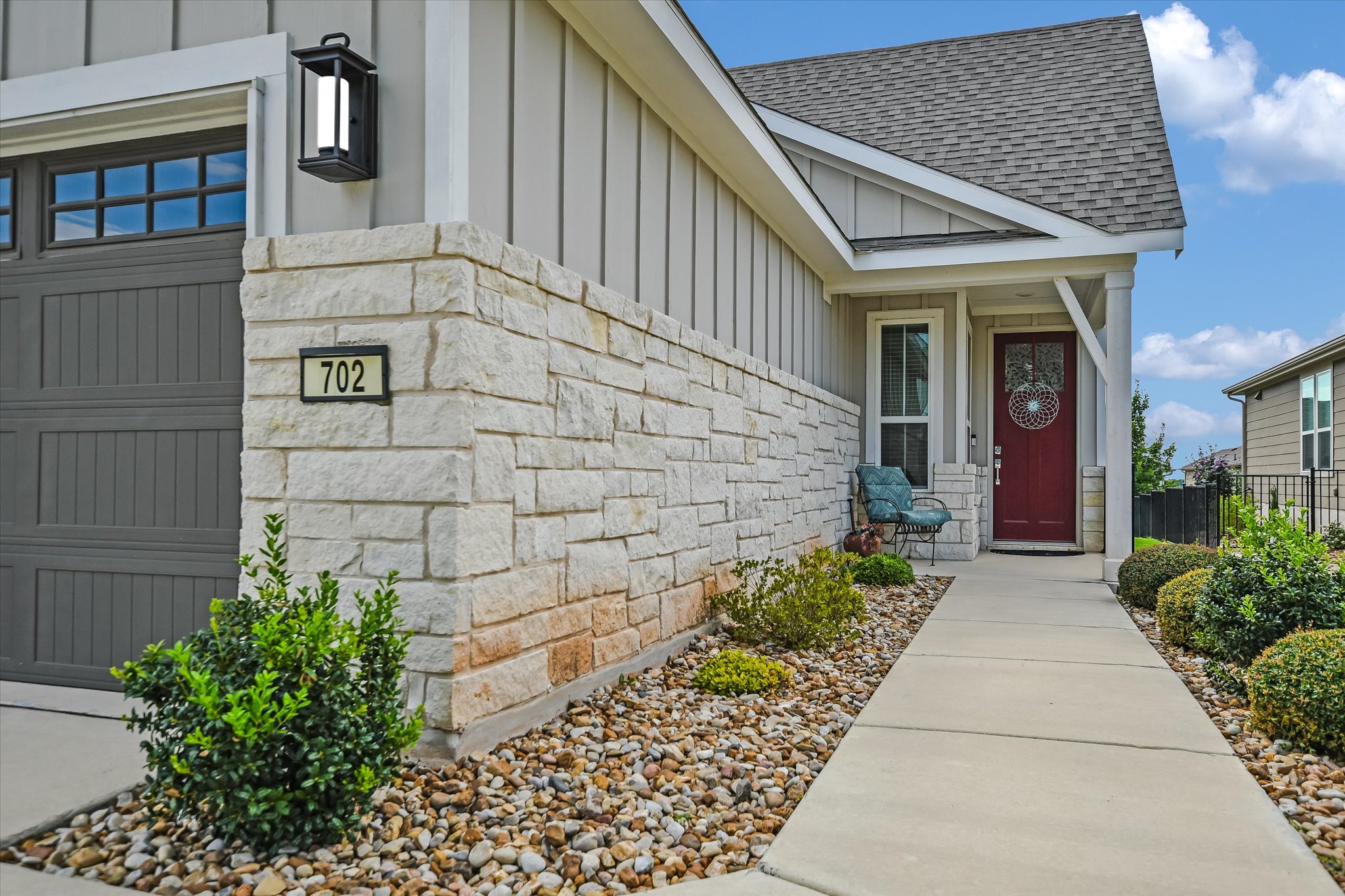 702 Kitty Hawk Road Georgetown, TX 78633 - Photo 3 of 21 a front view of a house with a garden