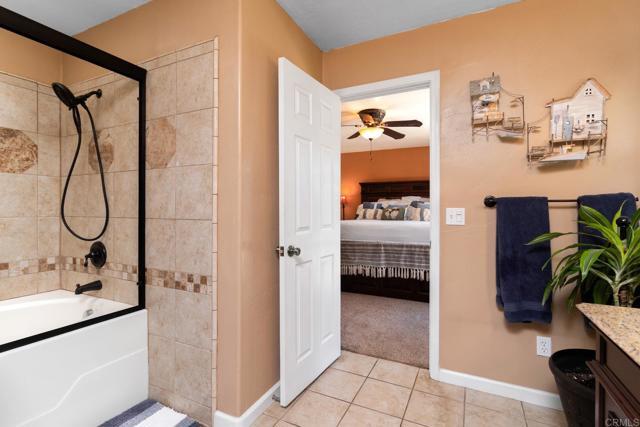 23452 Barona Mesa Road Ramona, CA 92065 - Photo 14 of 27 a en suite bathroom with a shower and a sink