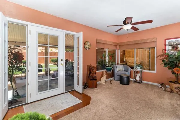 a view of livingroom with furniture and floor to ceiling window