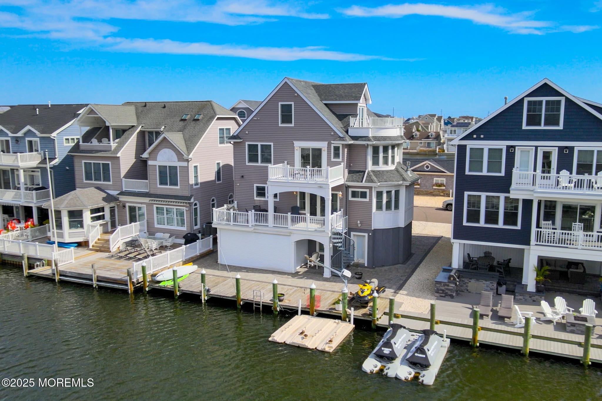 417 Delray Drive Lavallette, NJ 08735 - Photo 12 of 71 an aerial view of a house with swimming pool and sitting area