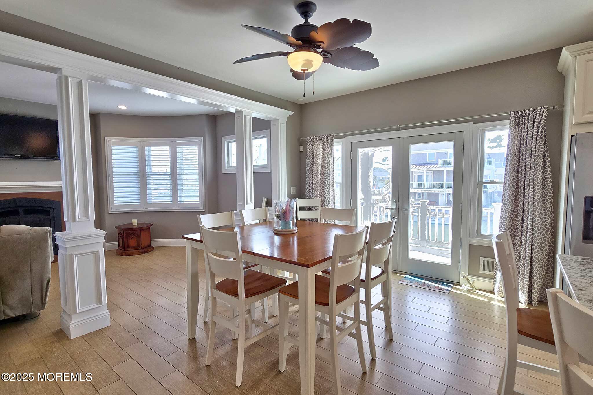 417 Delray Drive Lavallette, NJ 08735 - Photo 17 of 71 a view of a dining room with furniture window and wooden floor