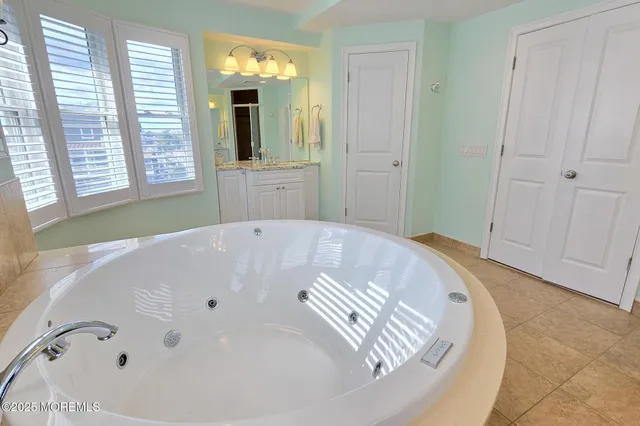a view of a storage & utility room with a sink