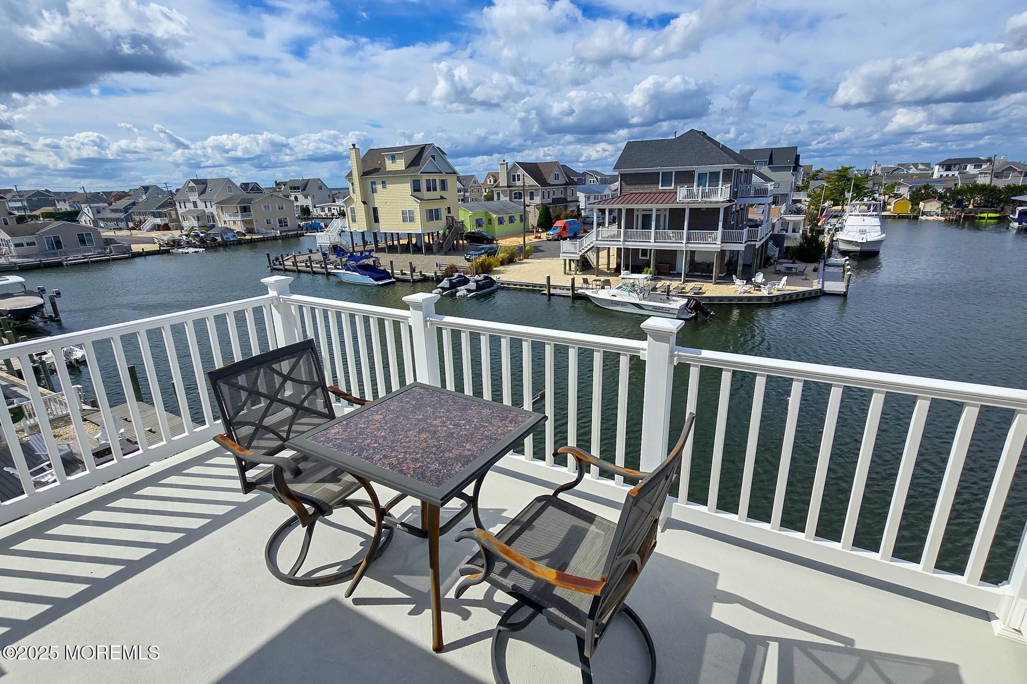 417 Delray Drive Lavallette, NJ 08735 - Photo 37 of 71 a view of a balcony with chairs