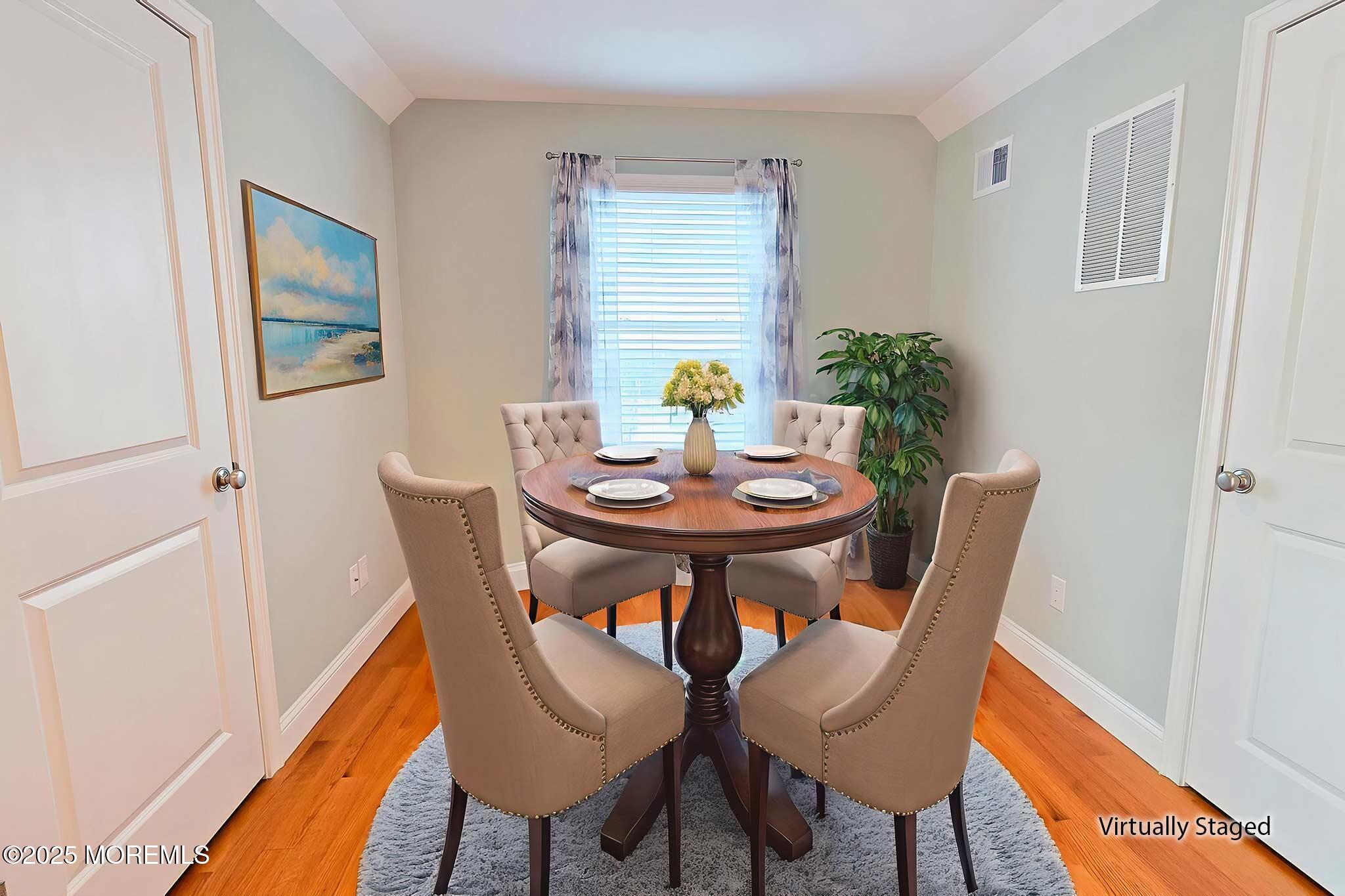 417 Delray Drive Lavallette, NJ 08735 - Photo 44 of 71 a view of a dining room with furniture and wooden floor