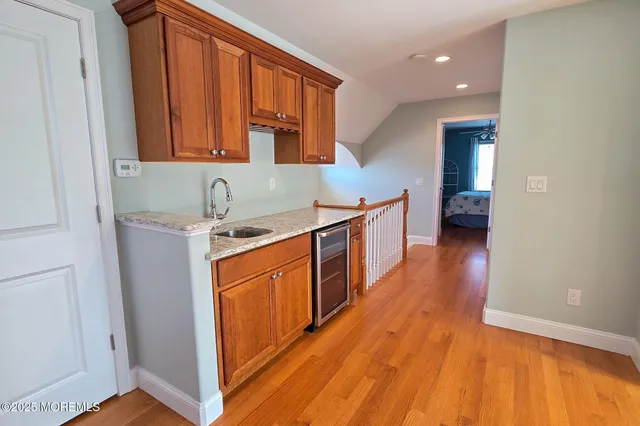 a view of living room with furniture and flat screen tv