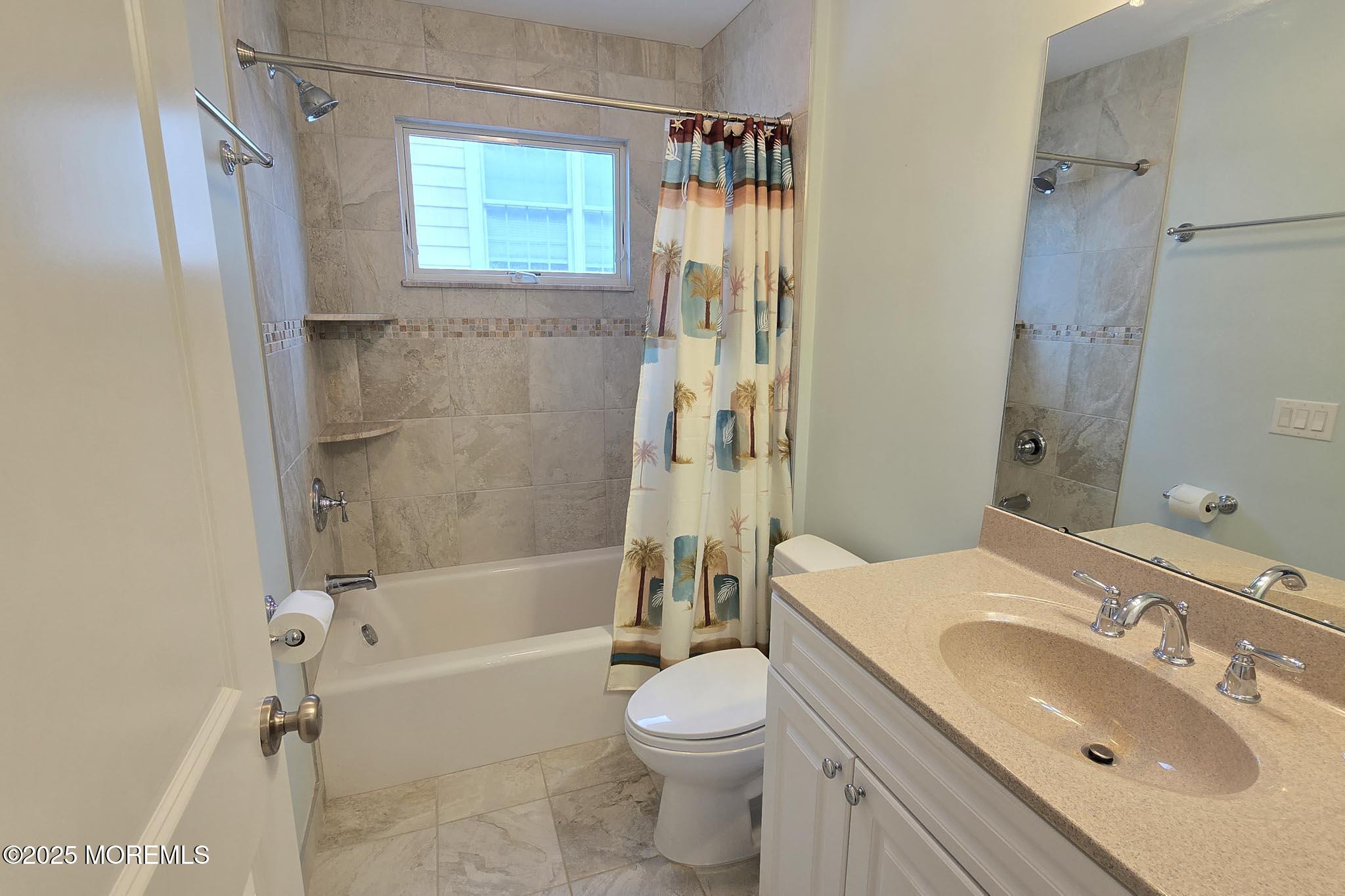 417 Delray Drive Lavallette, NJ 08735 - Photo 47 of 71 a bathroom with a sink toilet and shower