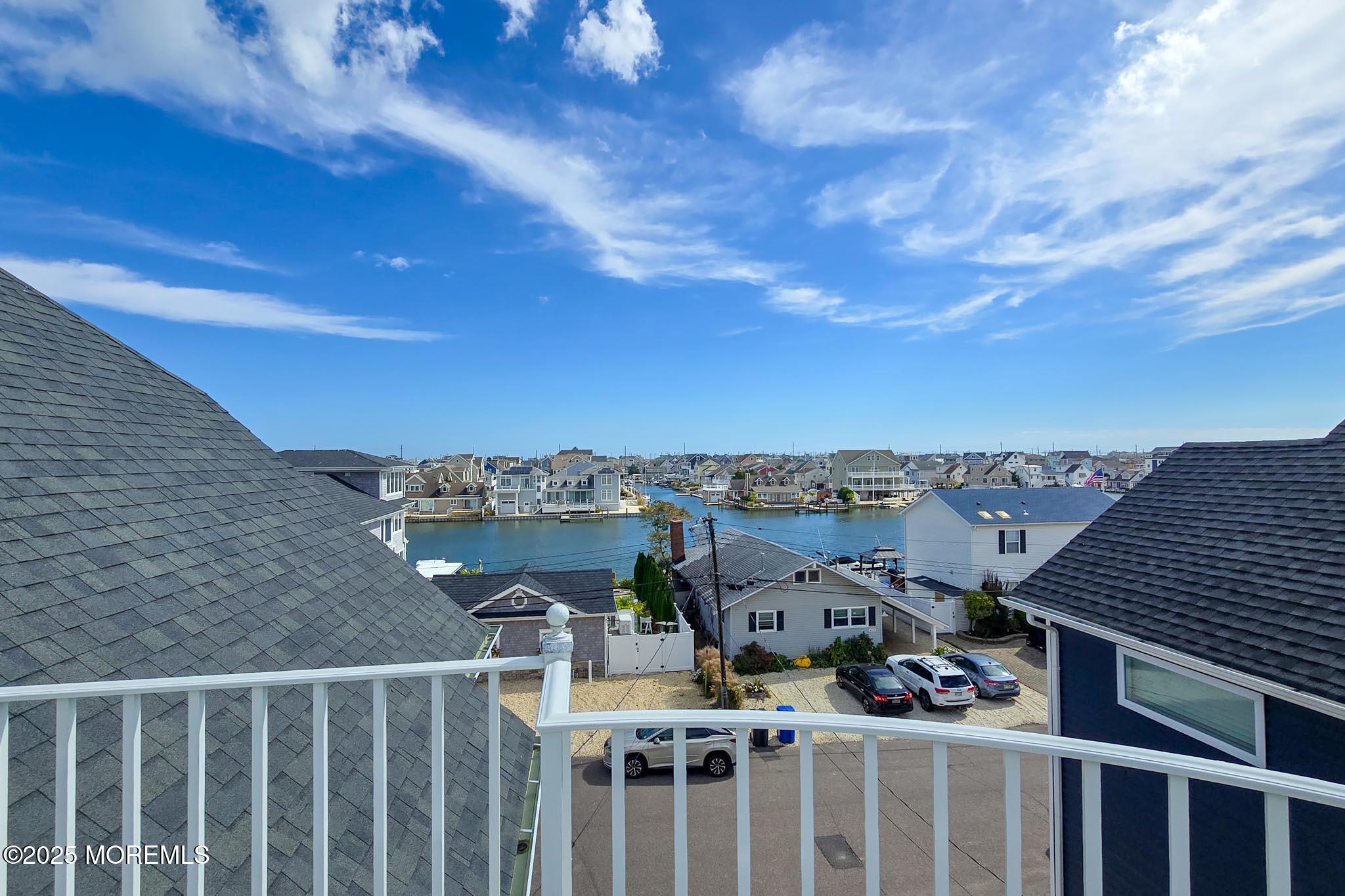 417 Delray Drive Lavallette, NJ 08735 - Photo 50 of 71 a view of a balcony with an outdoor seating