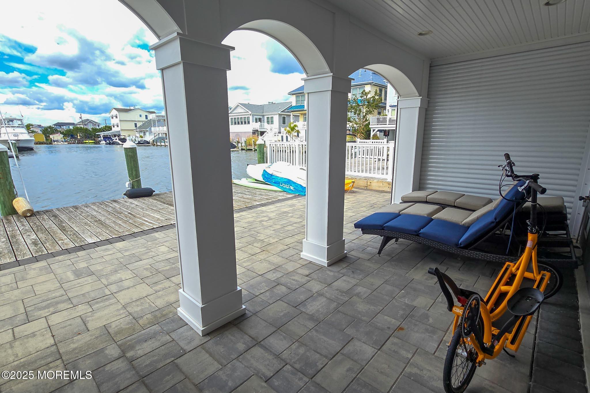 417 Delray Drive Lavallette, NJ 08735 - Photo 59 of 71 a view of balcony with two chairs and a table
