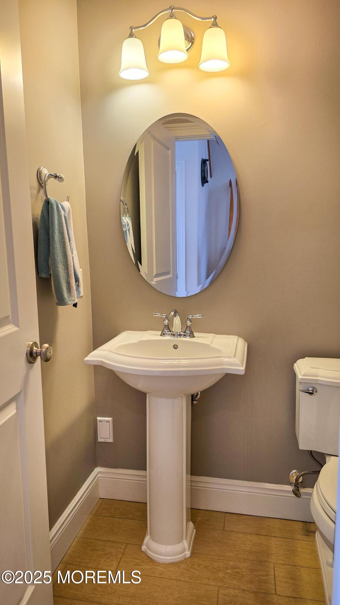 417 Delray Drive Lavallette, NJ 08735 - Photo 71 of 71 a bathroom with a sink mirror and toilet