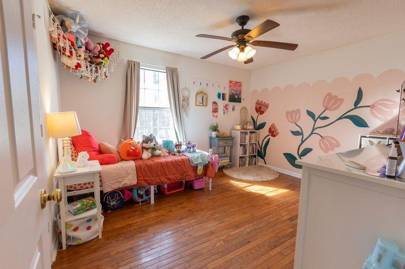 5028 Bird Road Gainesville, GA 30506 - Photo 19 of 34 a living room with furniture and a large window