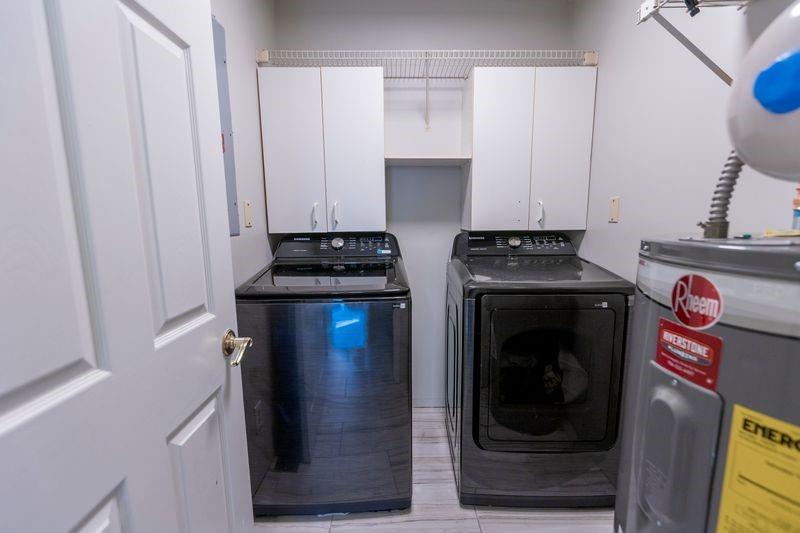 5028 Bird Road Gainesville, GA 30506 - Photo 27 of 34 a kitchen with a stove and a refrigerator