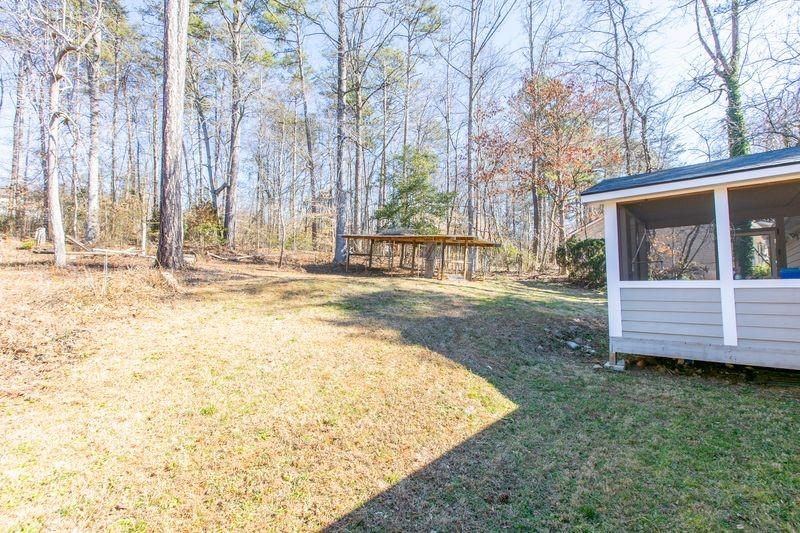 5028 Bird Road Gainesville, GA 30506 - Photo 33 of 34 a view of a house with backyard and sitting area