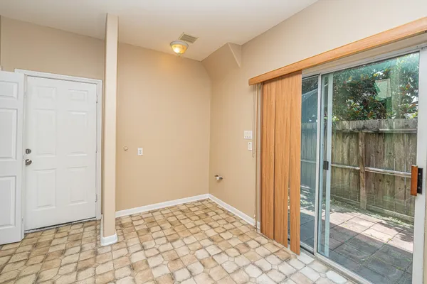 a view of a bathroom with a glass door and shower