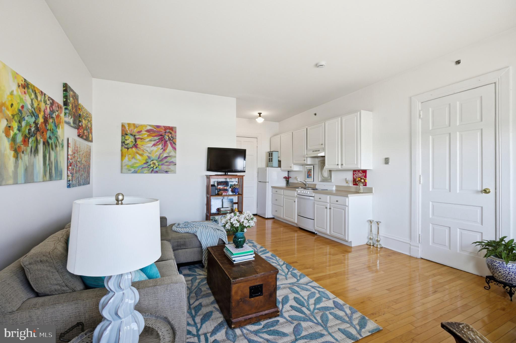 22 North Main Street, Unit 6 Doylestown, PA 18901 - Photo 11 of 21 Bright and inviting open-concept living space.