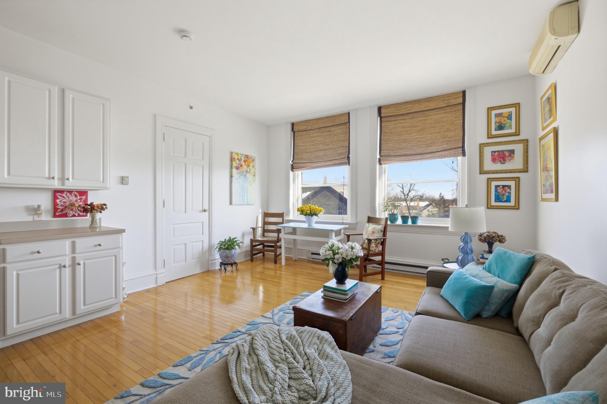 22 North Main Street, Unit 6 Doylestown, PA 18901 - Photo 12 of 21 Bright and airy living space with charm.