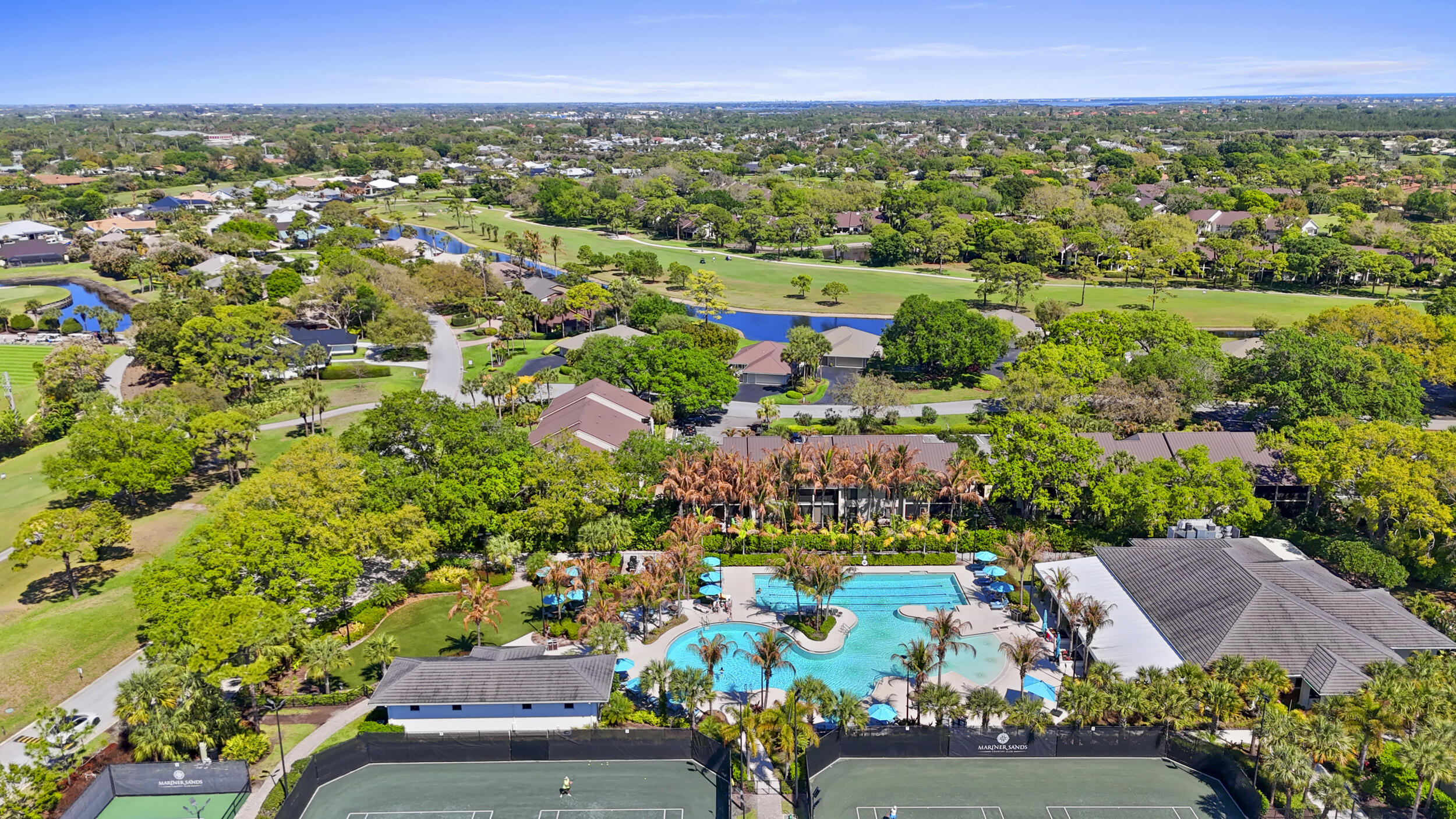 5172 Southeast Club Way, Unit 207 Stuart, FL 34997 - Photo 57 of 87 54_dji_20260323235532_0214_d
