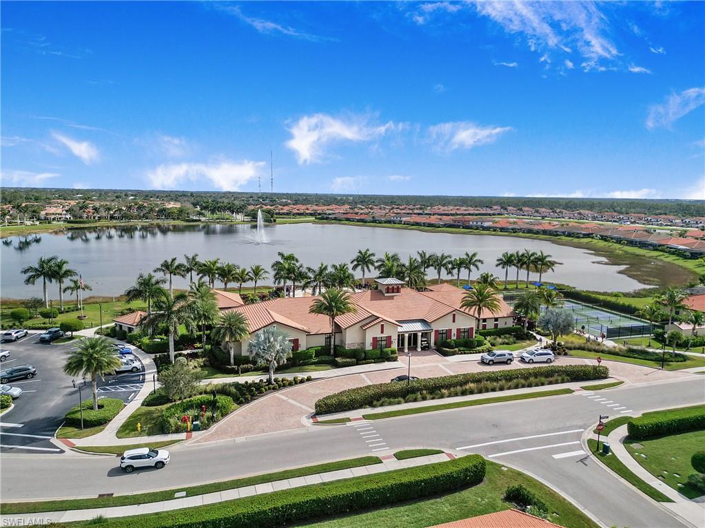 1238 Kendari Terrace Naples, FL 34113 - Photo 36 of 50 Aerial view of residential area with a large body of water