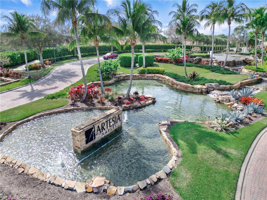 1238 Kendari Terrace Naples, FL 34113 - Photo 43 of 50 View of property's community with a water feature