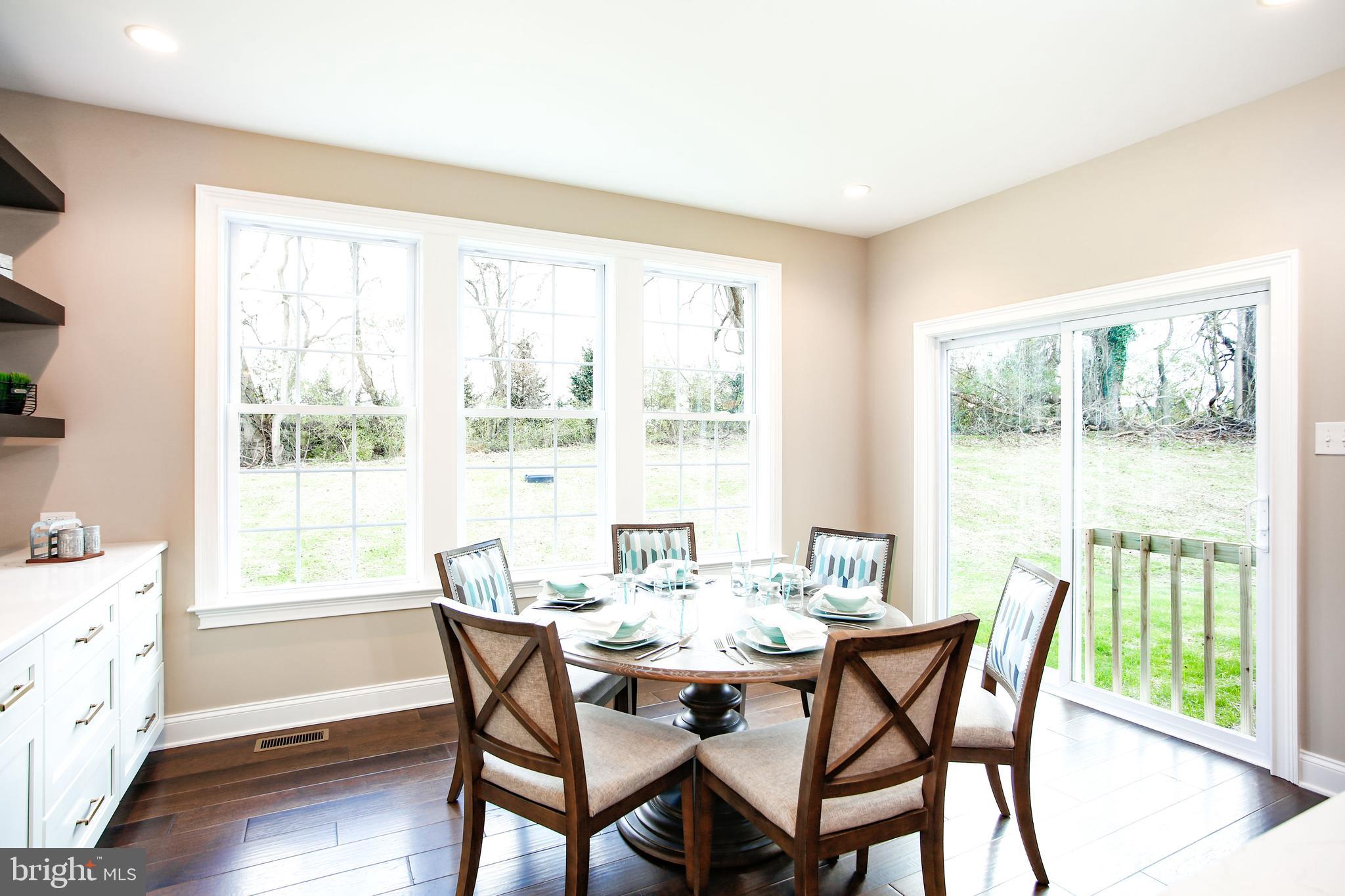 239 South Fairville Road Chadds Ford, PA 19317 - Photo 11 of 16 a dining room with furniture window wooden floor
