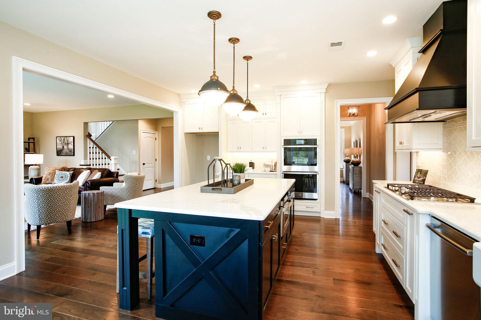 239 South Fairville Road Chadds Ford, PA 19317 - Photo 12 of 16 a large kitchen with a table and chairs