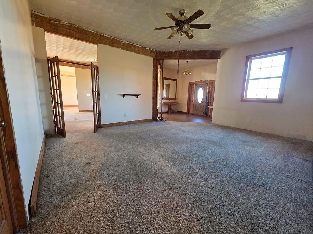 3520 Dixonville Road Marion Center, PA 15759 - Photo 3 of 30 a view of a livingroom with a ceiling fan and window