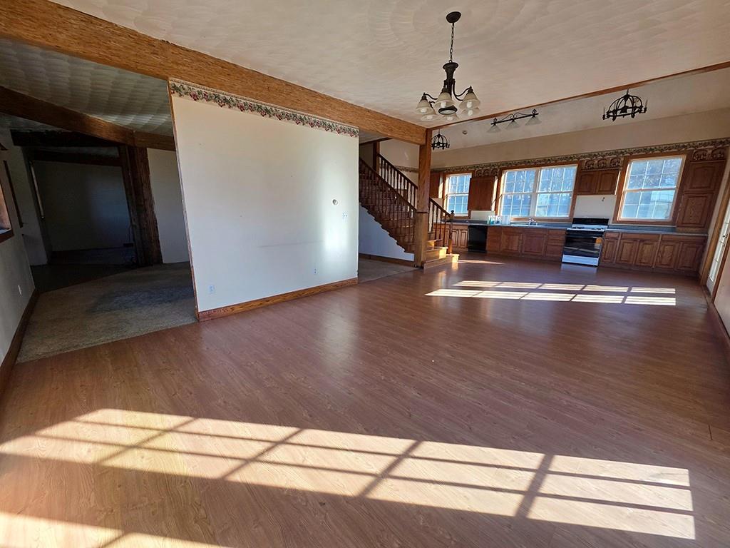 3520 Dixonville Road Marion Center, PA 15759 - Photo 6 of 30 a view of a livingroom with wooden floor and stairs