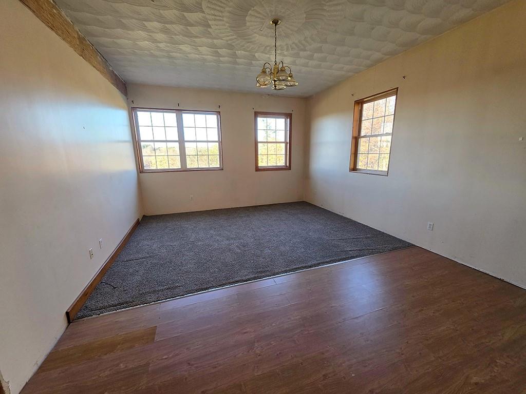 3520 Dixonville Road Marion Center, PA 15759 - Photo 8 of 30 an empty room with wooden floor and windows