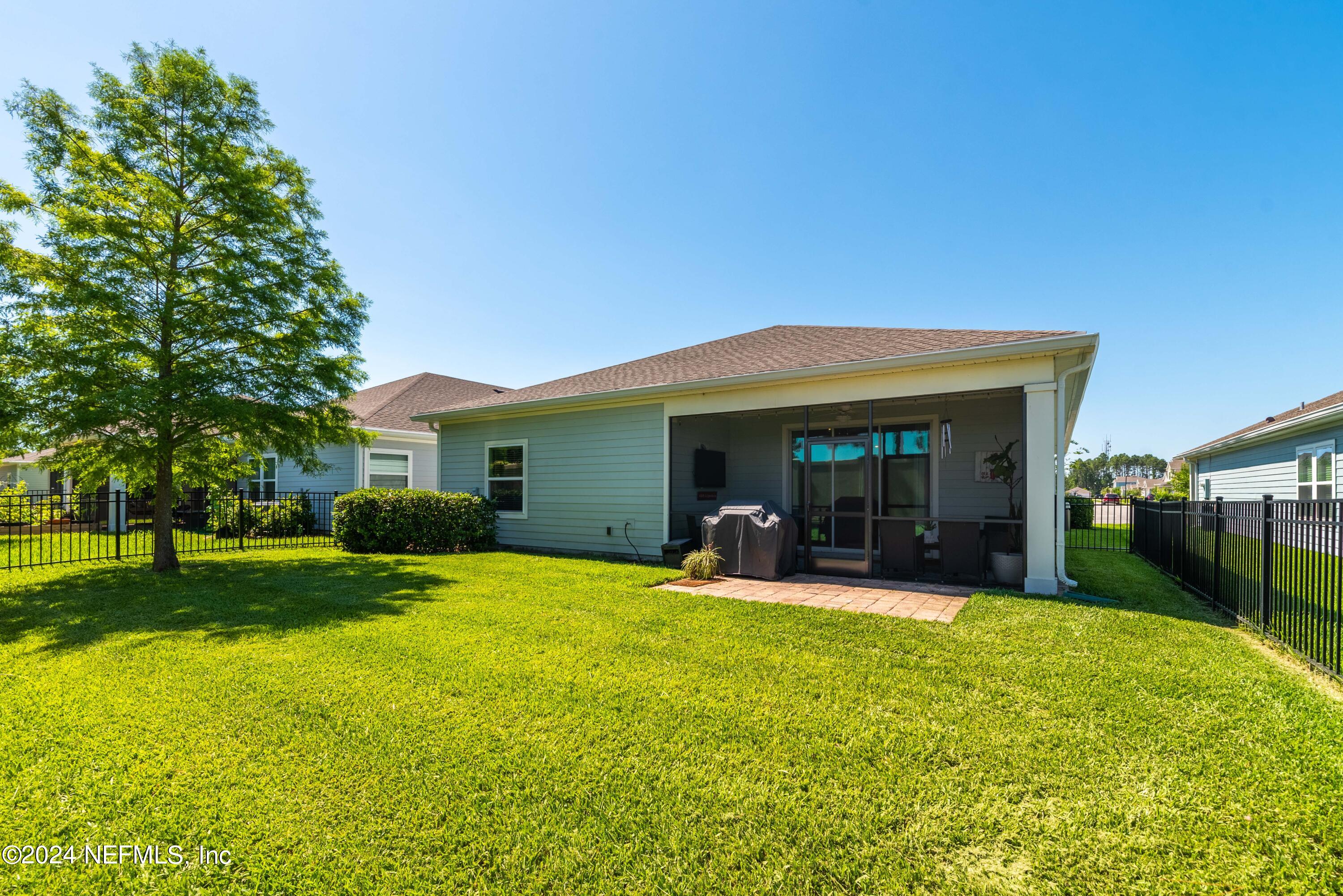 2672 Alexia Circle Jacksonville, FL 32246 - Photo 27 of 33 a view of a house with a backyard porch and sitting area