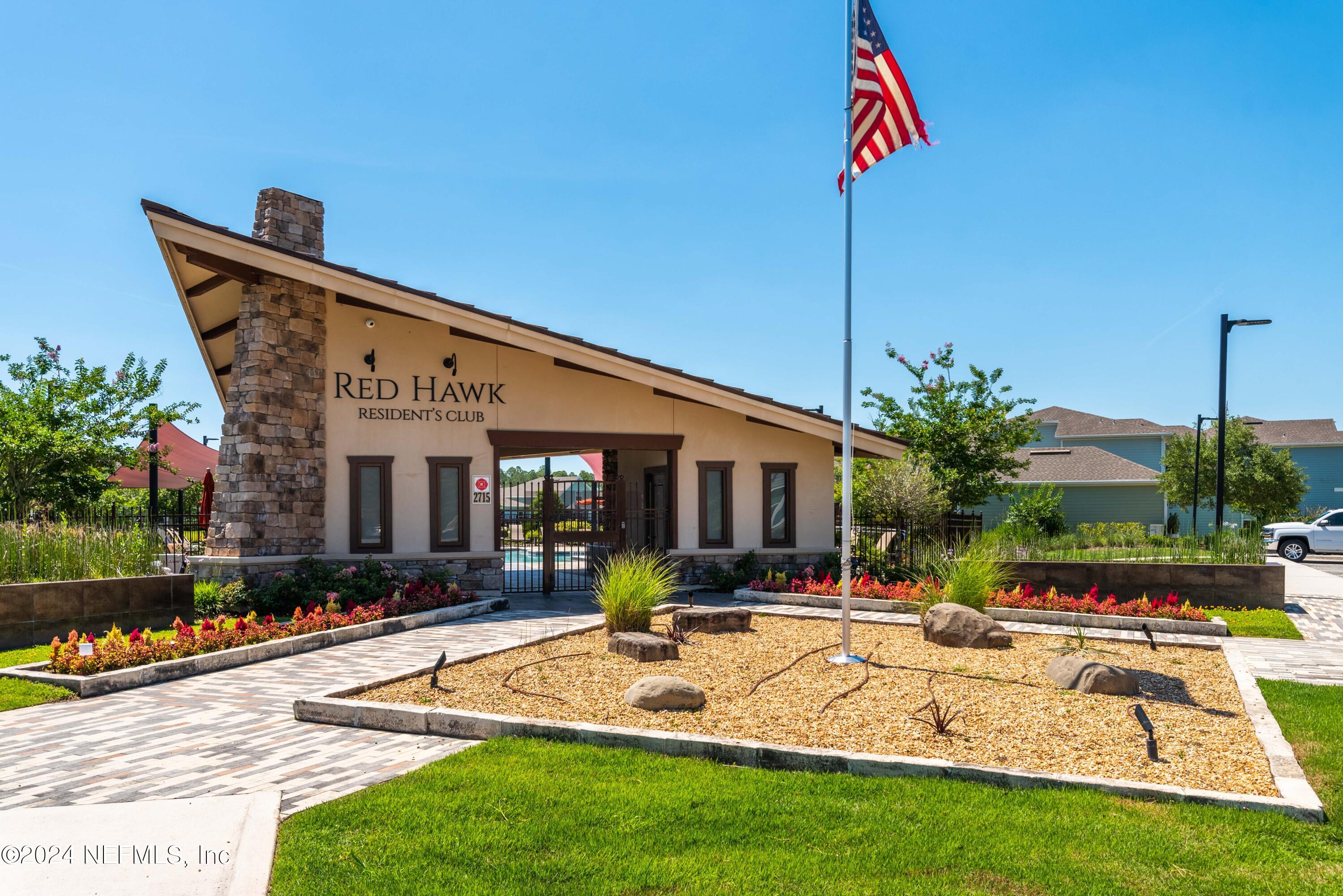 2672 Alexia Circle Jacksonville, FL 32246 - Photo 30 of 33 a row of palm trees sitting in front of a house