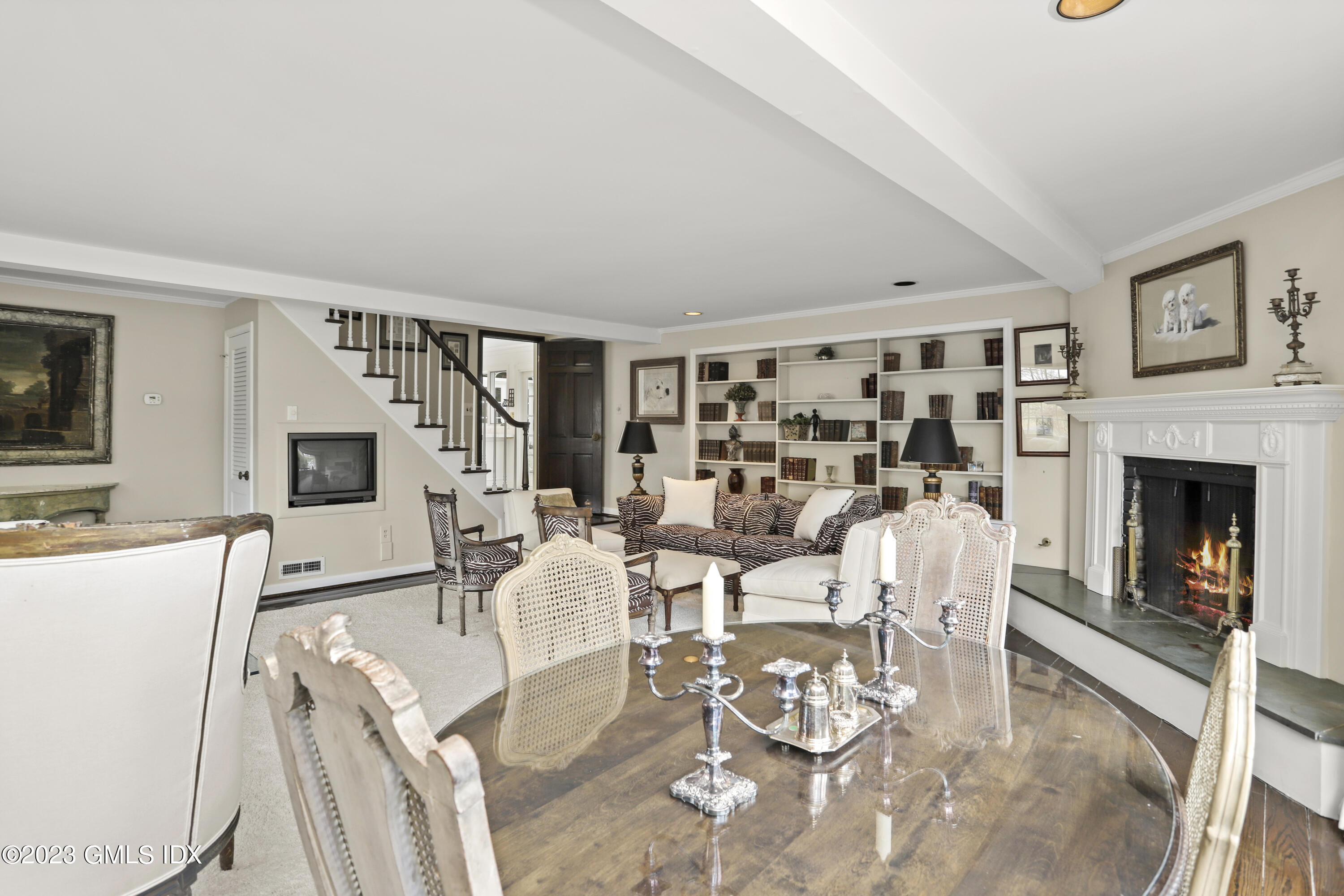 36 Golf Club Road Greenwich, CT 06830 - Photo 14 of 32 a living room with furniture a flat screen tv and a fireplace